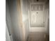 Unfinished bathroom featuring a shower-tub combo at 2760 Rains Mill Rd, Princeton, NC 27569