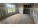 Unfinished bedroom with a large window at 2760 Rains Mill Rd, Princeton, NC 27569