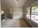 Unfinished living room shows drywall and window, ready for customization and design at 2760 Rains Mill Rd, Princeton, NC 27569