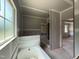 Unfinished main bathroom featuring a shower and tub area, ready for customization and design at 2760 Rains Mill Rd, Princeton, NC 27569