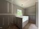 Unfinished main bathroom features a platform tub area, awaiting final finishes and design at 2760 Rains Mill Rd, Princeton, NC 27569