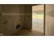 Unfinished mudroom showing utility connections, ready for customization at 2760 Rains Mill Rd, Princeton, NC 27569