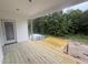 New wooden porch featuring durable construction and an open layout to the wooded backyard at 2760 Rains Mill Rd, Princeton, NC 27569