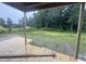 A wood porch under construction with a view of wooded backyard at 2776 Rains Mill Rd, Princeton, NC 27569