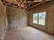 Bedroom with wood-frame construction, insulation, and large window at 2776 Rains Mill Rd, Princeton, NC 27569