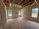 Bedroom with wood-frame construction, insulation, and abundant natural light at 2776 Rains Mill Rd, Princeton, NC 27569