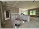 A home's living space is in the process of being built, featuring drywall and various construction supplies at 2776 Rains Mill Rd, Princeton, NC 27569