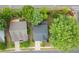 Aerial shot showcasing the property's well-manicured lawn, mature trees, and neighborhood surroundings at 2855 Wilkes Lake Dr, Fuquay Varina, NC 27526