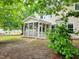 Scenic view of the home's rear exterior, highlighting the inviting screened porch at 2855 Wilkes Lake Dr, Fuquay Varina, NC 27526
