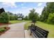 Inviting community park with benches and walking paths, ideal for enjoying nature and outdoor activities at 2855 Wilkes Lake Dr, Fuquay Varina, NC 27526