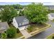 Charming two-story home with a two-car garage and mature trees providing shade and curb appeal at 2855 Wilkes Lake Dr, Fuquay Varina, NC 27526