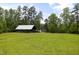 Picturesque park with a picnic shelter and a lush green lawn, perfect for outdoor gatherings at 2855 Wilkes Lake Dr, Fuquay Varina, NC 27526