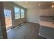 Bright dining area with access to the backyard and modern light fixtures at 293 Gregory Village Dr, Lillington, NC 27546