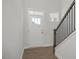 Welcoming foyer with staircase and natural light at 293 Gregory Village Dr, Lillington, NC 27546