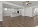 Large living room with kitchen and hardwood flooring at 293 Gregory Village Dr, Lillington, NC 27546