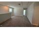 The second-floor loft boasts neutral carpeting, fresh paint, and plenty of natural light at 293 Gregory Village Dr, Lillington, NC 27546