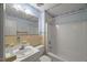 Clean and functional bathroom with a tub-shower combo and vanity, designed with practical features at 3025 Wycliff Rd, Raleigh, NC 27607