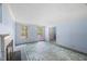 Bright, open living room featuring two windows, a fireplace, and multiple doorways at 3025 Wycliff Rd, Raleigh, NC 27607