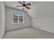 Cozy bedroom with a window and ceiling fan, perfect for relaxation at 3108 Lawson Walk Way, Rolesville, NC 27571