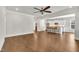 Spacious living room with hardwood floors and open access to the kitchen and breakfast area at 3108 Lawson Walk Way, Rolesville, NC 27571