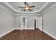 Spacious main bedroom with tray ceiling, fan and ensuite bathroom at 3108 Lawson Walk Way, Rolesville, NC 27571