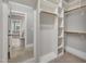 Spacious walk-in closet features custom shelving and ample storage space at 3108 Lawson Walk Way, Rolesville, NC 27571