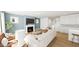 Inviting living room features a fireplace, stylish furnishings, and an open layout connecting to the kitchen at 339 Beacon Dr, Pittsboro, NC 27312