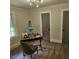 Inviting bedroom featuring stylish decor, wood-look flooring and a neutral color palette at 3669 W Greensboro Chapel Hill Rd, Liberty, NC 27298