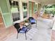 Charming front porch with a seating area and views of the surrounding landscape at 3669 W Greensboro Chapel Hill Rd, Liberty, NC 27298