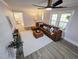 Spacious living room filled with natural light, modern ceiling fan and comfortable seating at 3669 W Greensboro Chapel Hill Rd, Liberty, NC 27298
