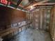 Interior of the shed with workbench and wooden walls at 3669 W Greensboro Chapel Hill Rd, Liberty, NC 27298