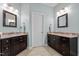 Dual vanity bathroom with granite countertops, dark cabinets and tile flooring at 4036 Mackenzie Dr, Haw River, NC 27258