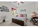 Well-lit bedroom featuring a large window with a seating area and comfortable bed at 4036 Mackenzie Dr, Haw River, NC 27258