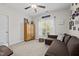 Comfortable bedroom featuring a window with natural light and a comfortable seating area at 4036 Mackenzie Dr, Haw River, NC 27258