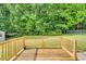 Wooden deck overlooking the backyard is ideal for outdoor dining and entertaining at 404 Southerby Dr, Garner, NC 27529