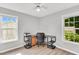 Office area features wood floors, neutral walls, and natural light from two windows at 404 Southerby Dr, Garner, NC 27529
