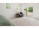 Bright bedroom with sliding door leading to outdoor deck at 406 Johns Woods Rd, Chapel Hill, NC 27516