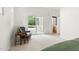 Bright bedroom featuring a sliding door leading to outdoor deck at 406 Johns Woods Rd, Chapel Hill, NC 27516
