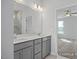 Bathroom with double sink vanity, and tile shower with glass door at 422 Grading Stick Ct, Angier, NC 27501
