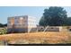 New construction home shows the start of a beautiful Davidson home with a concrete foundation and framing at 422 Grading Stick Ct, Angier, NC 27501