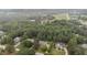 Aerial view of a community featuring homes surrounded by lush, mature trees and foliage at 50 Pebble Creek Dr, Franklinton, NC 27525