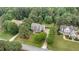Two-story home in a lush neighborhood with mature trees, manicured lawns, and long driveways at 50 Pebble Creek Dr, Franklinton, NC 27525