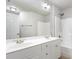 Well-lit bathroom featuring a double vanity with modern fixtures and a shower-tub combination at 50 Pebble Creek Dr, Franklinton, NC 27525
