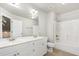 Bright bathroom featuring a double vanity with modern fixtures and a shower-tub combination at 50 Pebble Creek Dr, Franklinton, NC 27525