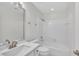 Bright bathroom featuring a shower-over-tub and a vanity with a marble countertop at 5121 Ten Point Trl, Wake Forest, NC 27587