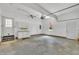 Large garage with lots of storage space, a utility sink, and room for two cars at 5121 Ten Point Trl, Wake Forest, NC 27587
