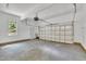 Spacious garage with ample storage space and natural light from the window at 5121 Ten Point Trl, Wake Forest, NC 27587