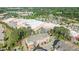 Overhead view of townhomes near shopping and commercial buildings at 518 Toran Dr, Wake Forest, NC 27587