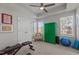 Bright bonus room featuring a ceiling fan, natural light, and a versatile space for various activities at 518 Toran Dr, Wake Forest, NC 27587