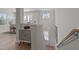Inviting foyer with decorative cabinet, hardwood floors, and stairway to the main level at 518 Toran Dr, Wake Forest, NC 27587